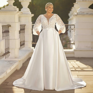 2024 Plus Size Wedding Dresses Classic Satin Bridal Dresses Puff Sleeves V Neck Beading Sequined A Line Bride Gown with Pockets
