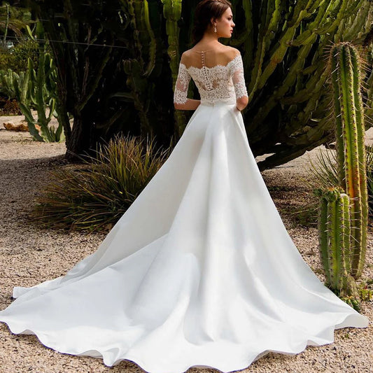Vestidos de noiva de pescoço elegante de barco elegante e perfeitos do ombro de renda de ombro 1/2 mangas do vestido de noiva