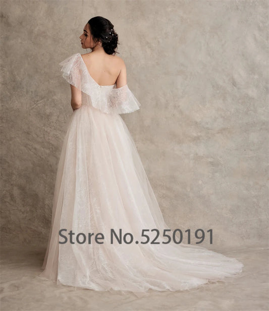 Exquisite One-Shoulder Applique Wedding Dress with Split Design Opulent Tulle Bridal Gown with Watteau Train for Women