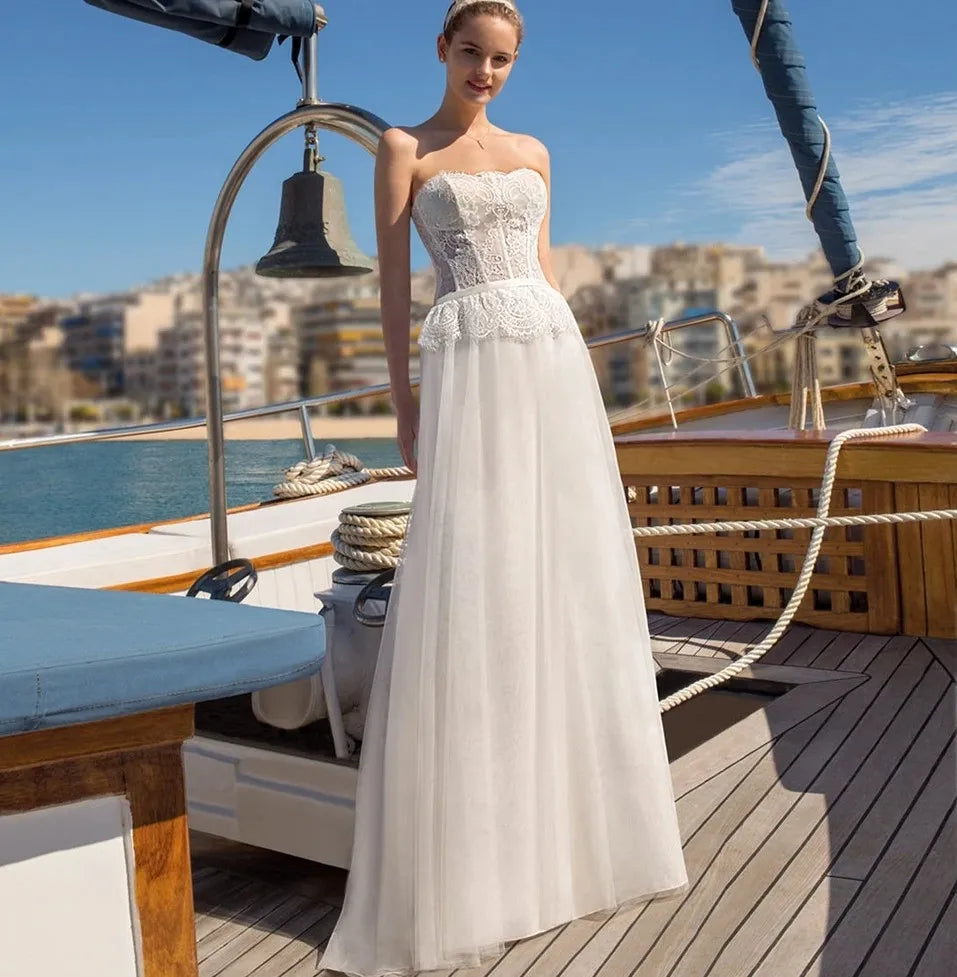 Strapless lace top sleeveless tulle A-line floor length bridal gown wedding dress 2026 – Pollyanna Events