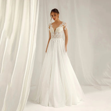 2025 Lace Applique Boho Wedding Dresses A-Line Tulle Backless Brides Wedding Gown Elegant Sleeveless Bridal Dresses Customized