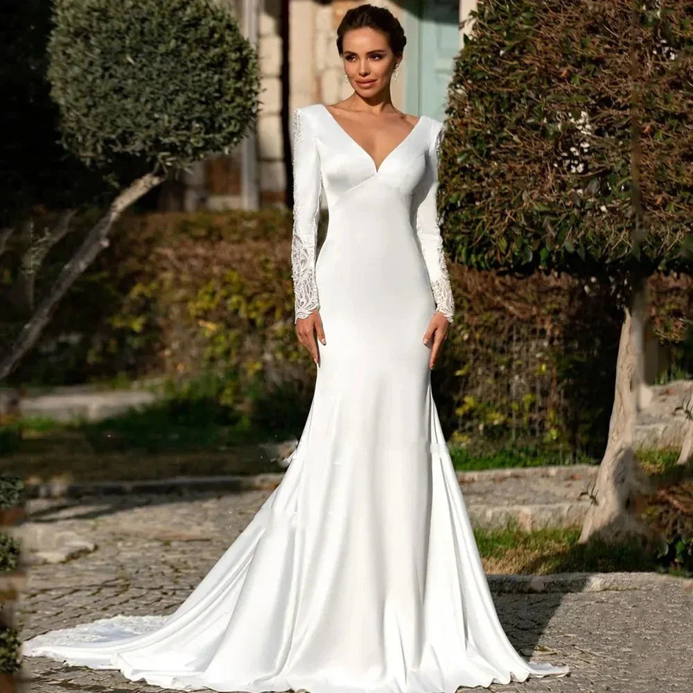 Classic deep V-neck full sleeves lace appliques open back satin bridal gown wedding dress 2026 – Pollyanna Events