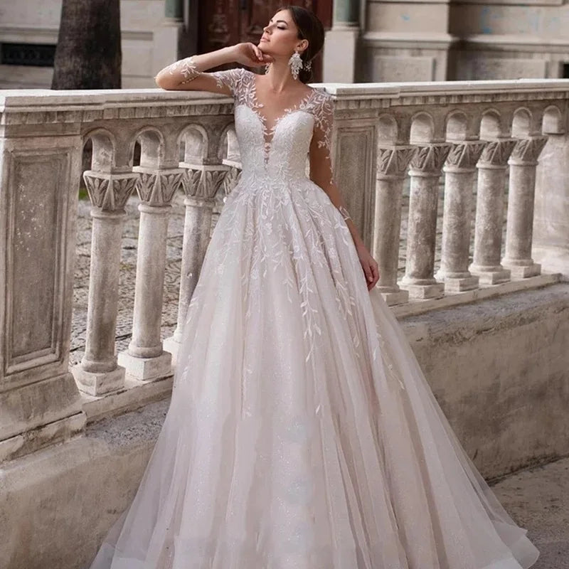 New modern V-neck long sleeves illusion lace applique tulle bridal gown wedding dress 2026 – Pollyanna Events