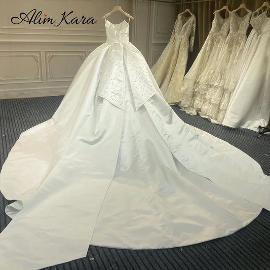 فستان زفاف منفوش 2024 لؤلؤ رائع بدون أكمام ذيل شابيل الأميرة XZ41