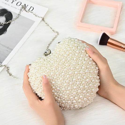 2024 Pearls hartvormige bruiloftskoppeling Turnus volle zijde kralen mini -portemonnee met kettingschoudertassen luxe designer handtas
