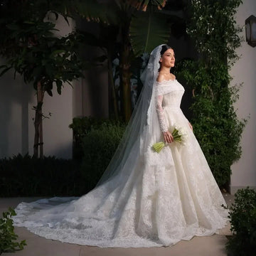Customzied Romantic Lace A-Line Boat-Neck 2025 Wedding Dress Off Shoulder Backless Court Train Long sleeves Bride Dress
