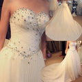 Elegant A-line sweetheart crystal beads court train tulle princess bridal gown wedding dress 2026 – Pollyanna Events