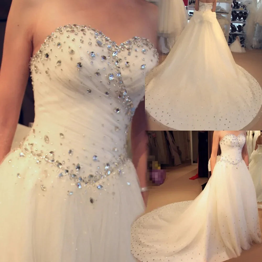 Elegant A-line sweetheart crystal beads court train tulle princess bridal gown wedding dress 2026 – Pollyanna Events