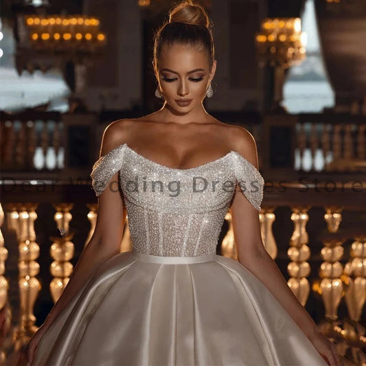 Arabisch van de schouderhuwelijksjurken sexy 2024 pailletten kralen prinses dames bruid jurken satin vestido de noiva gewaad платьееoorn