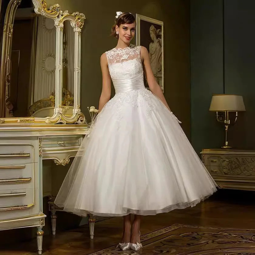 Classic short boat neck sleeveless buttons lace applique garden bridal gown wedding dress 2026 – Pollyanna Events
