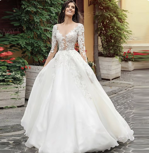 Robe de mariée en tulle blanc manches longues avec appliques en dentelle en décolleté fermement de bouton de bouton de mariée robes de mariée sur mesure