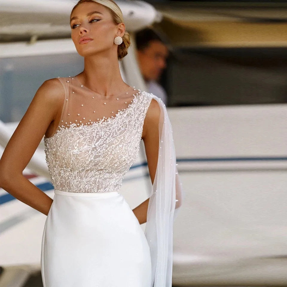 Elegant A-Line Wedding Dresses Sleeveless Lace Sequins Beads Chiffon O-Neck Sweep Train Button Back Bridal Gown With Cape