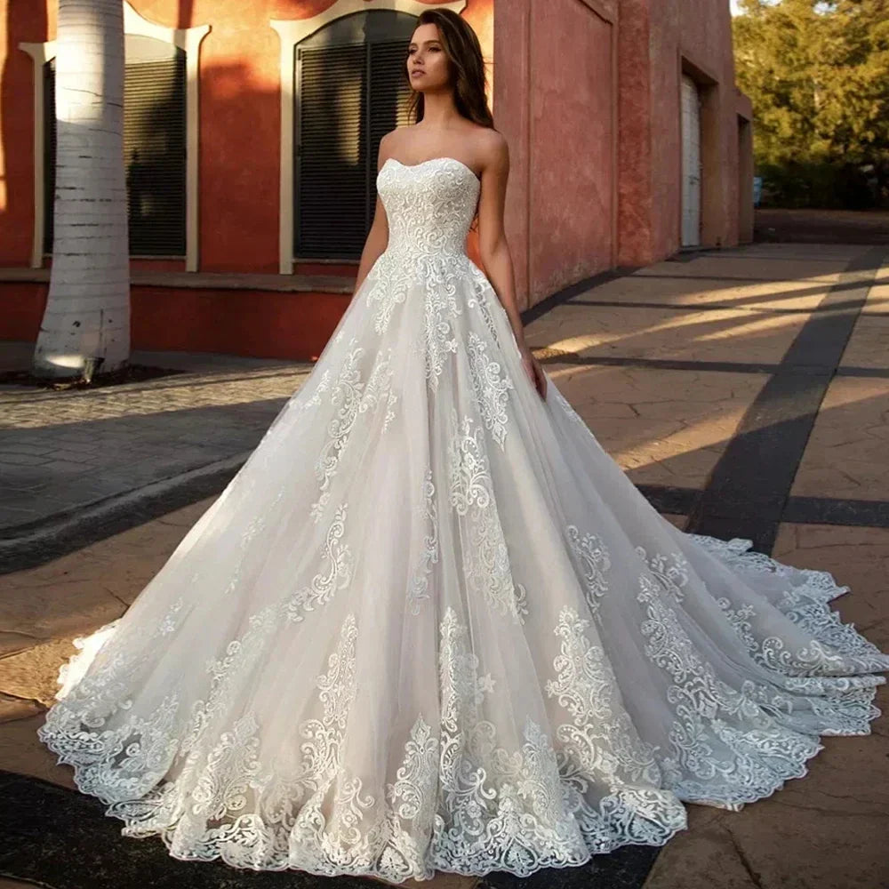 Elegant strapless lace appliques tulle A-line bridal gown sweep train wedding dress – Pollyanna Events