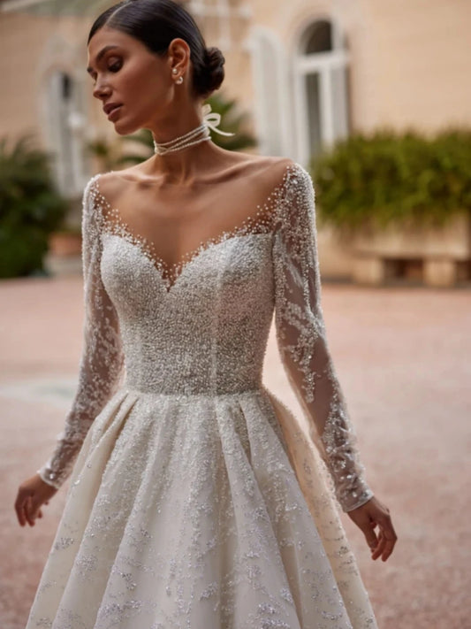 Klassieke O-neck Wedding Jurk met lange mouwen Sparkly Pearls Glitter Bride Robe Elegant A-Line Long Bridal Jurk Robe de Mariée